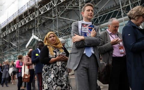 Attendees queue to attend day two of the Labour Party Conference - Credit: Dan Kitwood /Getty