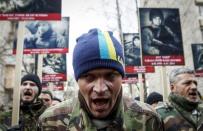 Activists of the Right Sector political party attend an anti-government march in Kiev, Ukraine, in this February 25, 2015 file photo. REUTERS/Valentyn Ogirenko/Files