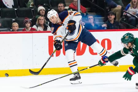 Feb 7, 2019; Saint Paul, MN, USA; Edmonton Oilers right wing Zack Kassian (44) scores an empty net goal against the Minnesota Wild during the third period at Xcel Energy Center. Mandatory Credit: Harrison Barden-USA TODAY Sports