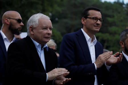 Law and Justice (PiS) leader Kaczynski and Poland's Prime Minister Morawiecki attend an election meeting in Stalowa Wola