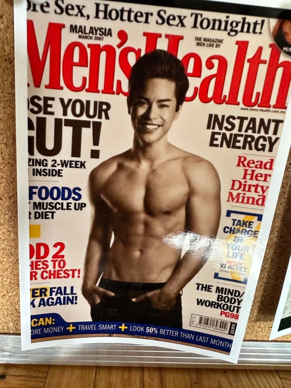 Memoribilia like this Men's Health cover are among the things that Alvin Pulga has kept of his time modelling in Asia.  