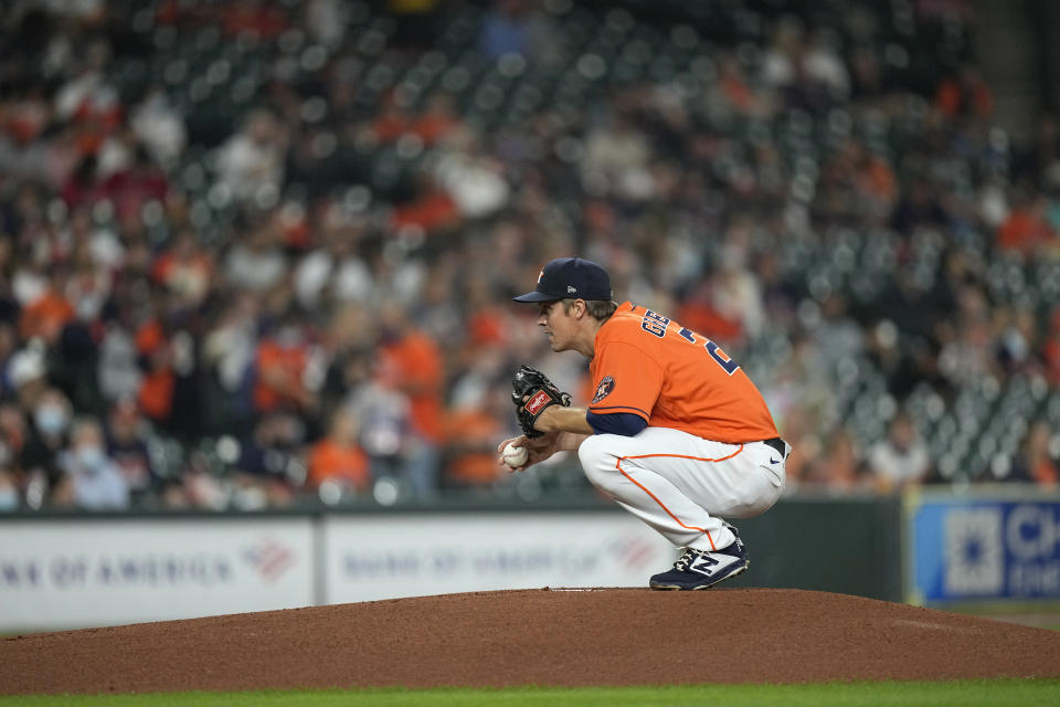Houston Astros starting pitcher Zack Greinke waits to throw against the Los Angeles Angels during the first inning of a baseball game Friday, April 23, 2021, in Houston. (AP Photo/David J. Phillip)