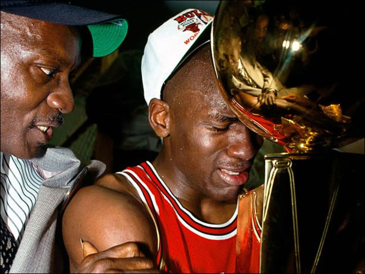 1991 NBA Championship Finals INGLEWOOD, CA - JUNE 12: Michael Jordan #23 of the Chicago Bulls celebrates with his father James Jordan in the locker room after winning Game 5 the 1991 NBA Championship Finals against the Los Angeles Lakers at the Great Western Forum in Inglewood, California. NOTE TO USER: User expressly acknowledges and agrees that, by downloading and or using this photograph, User is consenting to the terms and conditions of the Getty Images License Agreement. Mandatory copyright notice: Copyright 1991 NBAE (Photo by Andrew D. Bernstein/NBAE via Getty Images) Purchase a license Get personalized pricing by telling us about when, where, and how you want to use this image. SELECT OPTIONS SAVE TO CART Details Restrictions: USER IS NOT PERMITTED TO DOWNLOAD OR USE IMAGE WITHOUT PRIOR APPROVAL. Credit: Andrew D. Bernstein / Contributor Editorial #: 57018257 Collection: NBA Classic Date created: June 12, 1991 License type: Rights-managed Release info: Not released. More information Source: NBA Classic Object name: 56156683ADB_DNA034378001 Max file size: 2400 x 3000 px (8.00 x 10.00 in) - 300 dpi - 1.48 MB ** OUTS - ELSENT, FPG, CM - OUTS * NM, PH, VA if sourced by CT, LA or MoD **