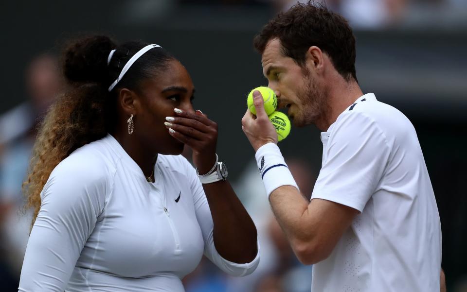 Serena Williams and Andy Murray play their second round match in the mixed doubles on Tuesday - Action Plus