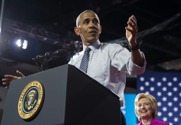 US President Barack Obama laid out a passionate, compelling case declaring he is "ready to pass the baton" to Hillary Clinton