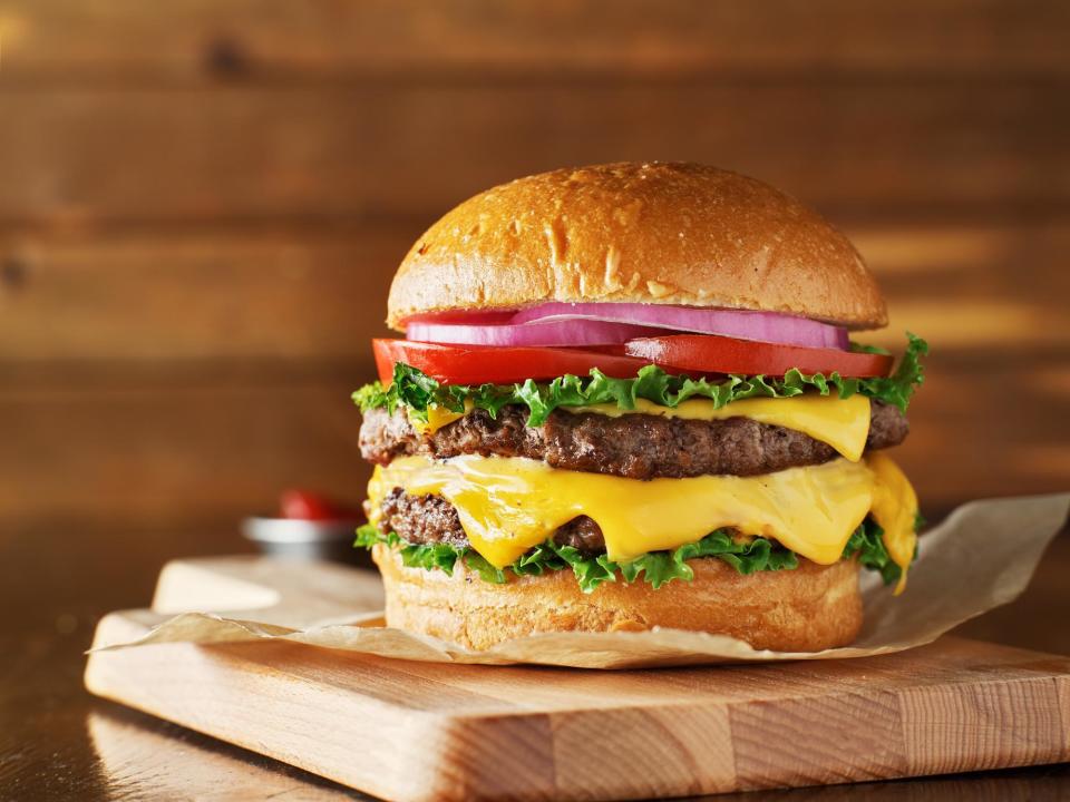 Where do you put the cheese on a burger?