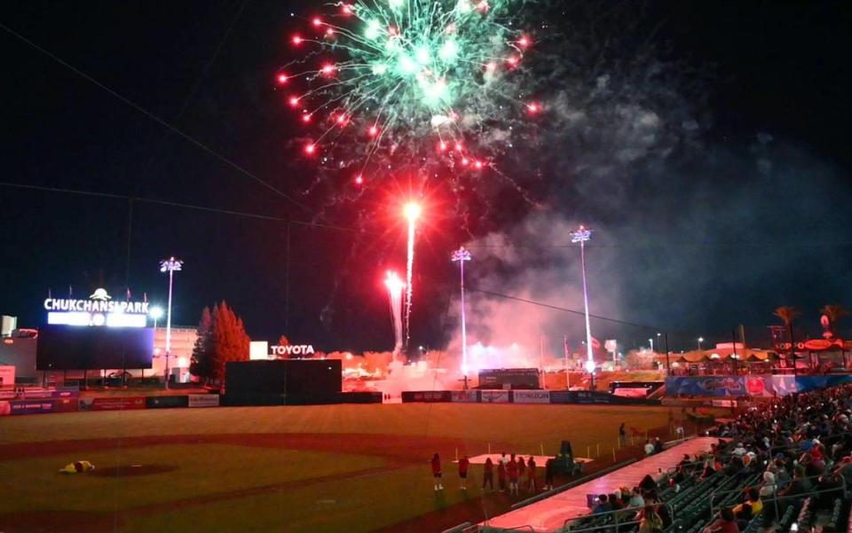 Fireworks color the sky at Chukchansi Park following the Fresno Grizzlies 2023 season home-opener against the Stockton Ports Tuesday night, April 11, 2023 in downtown Fresno. The Grizzlies lost the first of the six-game series 5-4 to the Ports.