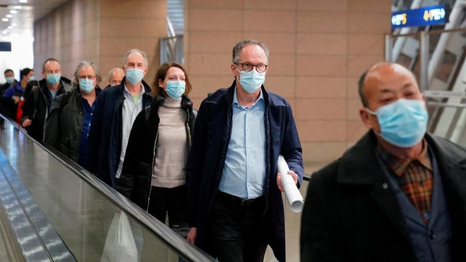 Members of the WHO team arrive in Shanghai (10 Feb)