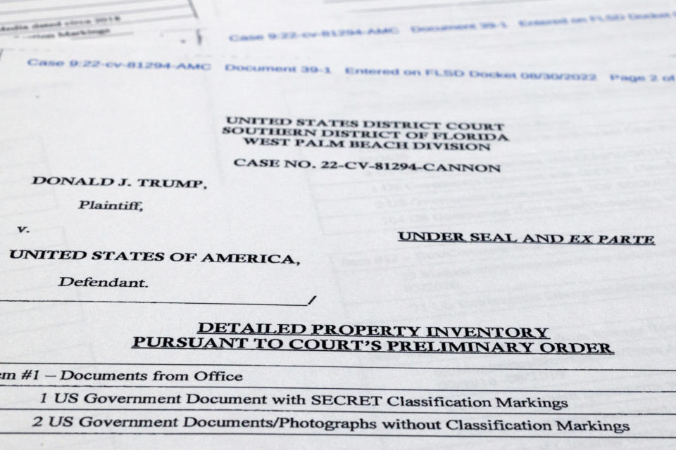 FILE - Pages from a FBI property list of items seized from former President Donald Trump's Mar-a-Lago estate and made public by the Department of Justice, are photographed Sept. 2, 2022. (AP Photo/Jon Elswick, File)