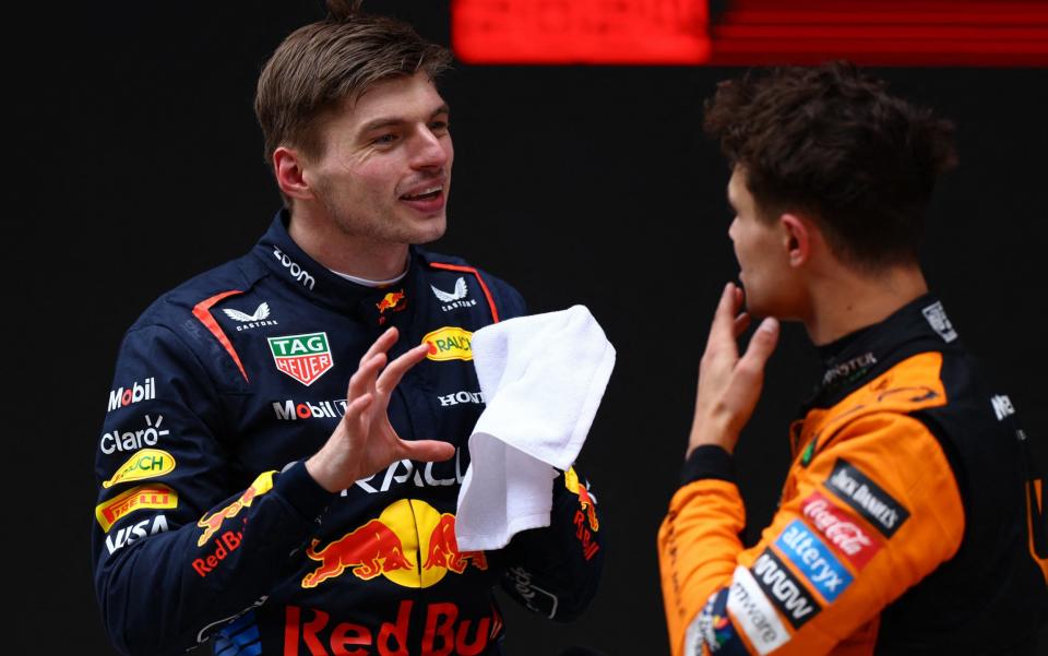 Shanghai International Circuit, Shanghai, China - April 21, 2024 Red Bull's Max Verstappen after winning the Chinese Grand Prix along with second placed McLaren's Lando Norri