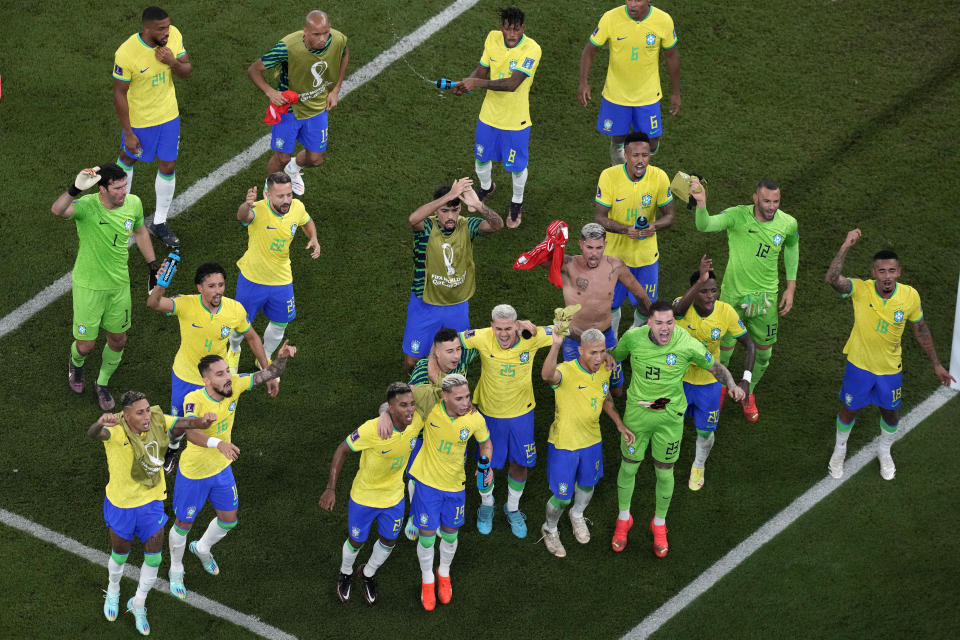 Brazil's players celebrate after winning the World Cup group G soccer match between Brazil and Switzerland, at the Stadium 974 in Doha, Qatar, Monday, Nov. 28, 2022. Brazil won 1-0. (AP Photo/Thanassis Stavrakis)