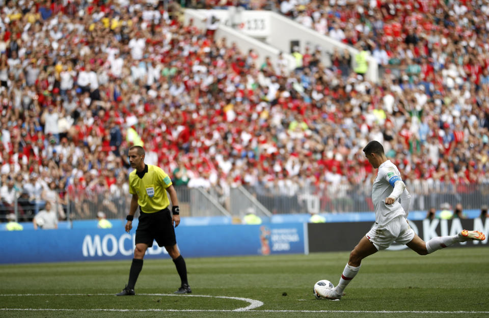 <p>Portugal’s Cristiano Ronaldo takes a free kick </p>