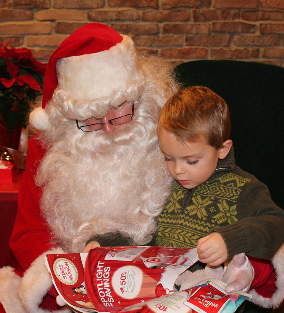 My 4-year-old boy decided that walking Santa through the Target toy catalog was more efficient than writing a list.