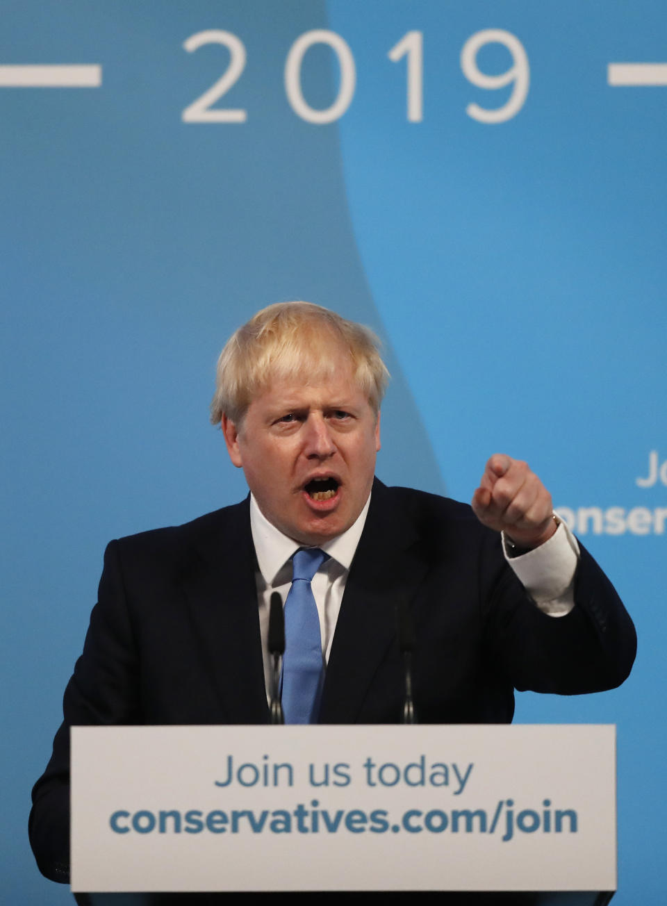 Boris Johnson gestures as he speaks after being announced as the new leader of the Conservative Party in London, Tuesday, July 23, 2019. Brexit champion Boris Johnson won the contest to lead Britain's governing Conservative Party on Tuesday, and will become the country's next prime minister. (AP Photo/Frank Augstein)