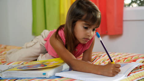 A girl doing homework.