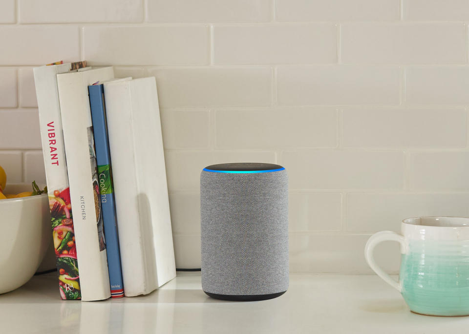 An Amazon Echo smart speaker sitting on a countertop