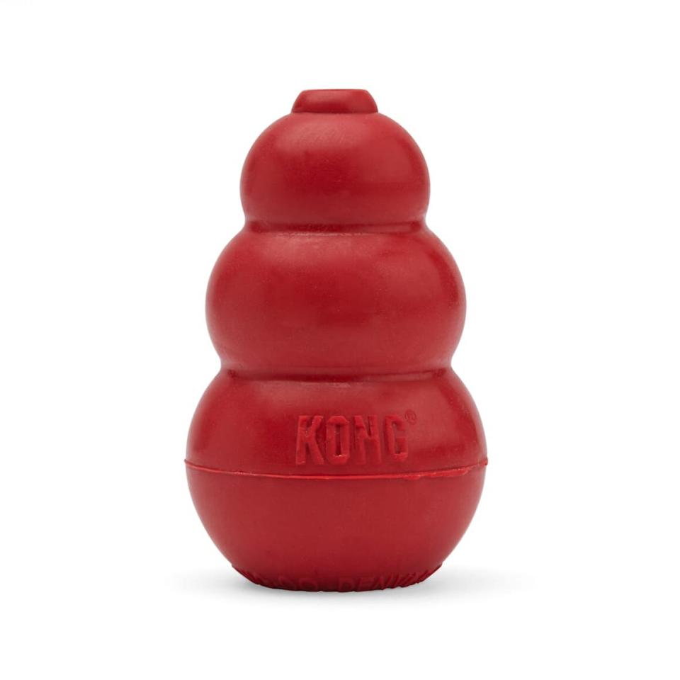 Red colored Kong Classic toy on a white background