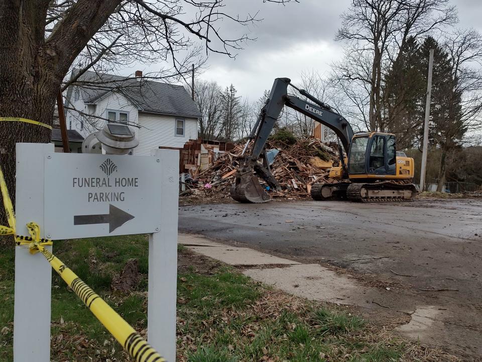 A two-family home at 30-32 Elm St. in the Village of Wellsville was recently demolished. Olney Foust Funeral Homes purchased the property in 2022 and said it will likely be utilized to expand a parking lot for the Main Street funeral home.