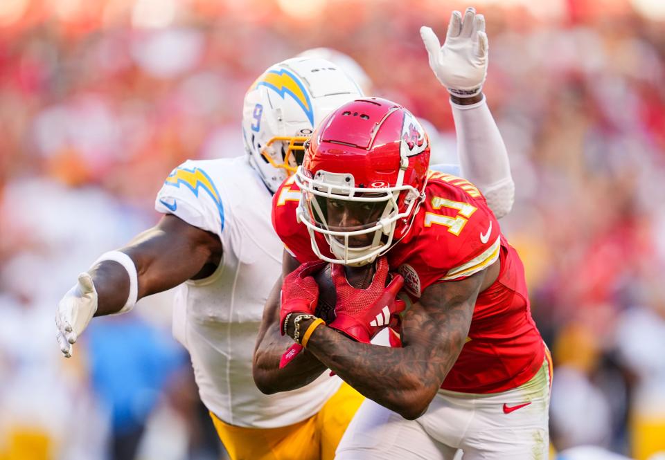 Kansas City Chiefs wide receiver Marquez Valdes-Scantling (11) runs with the ball against Los Angeles Chargers linebacker Kenneth Murray Jr.