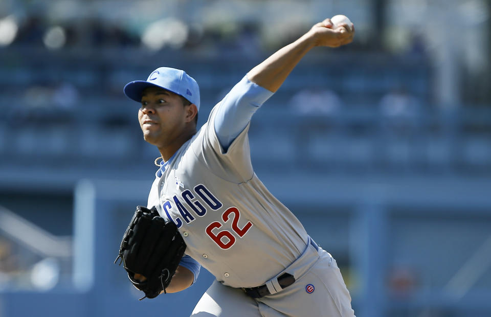 Chicago Cubs starting pitcher Jose Quintana throws to a Los Angeles Dodgers batter during the first inning of a baseball game in Los Angeles, Sunday, June 16, 2019. (AP Photo/Alex Gallardo)