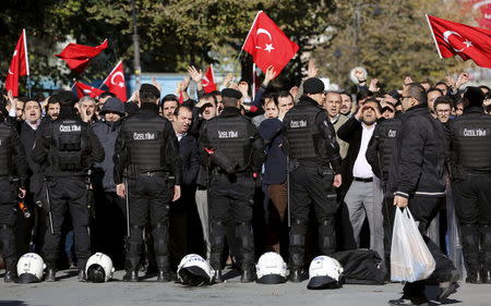 Supporters of Gulen movement shout slogans during a protest outisde the Kanalturk and Bugun TV building in Istanbul, Turkey, October 28, 2015. REUTERS/Murad Sezer