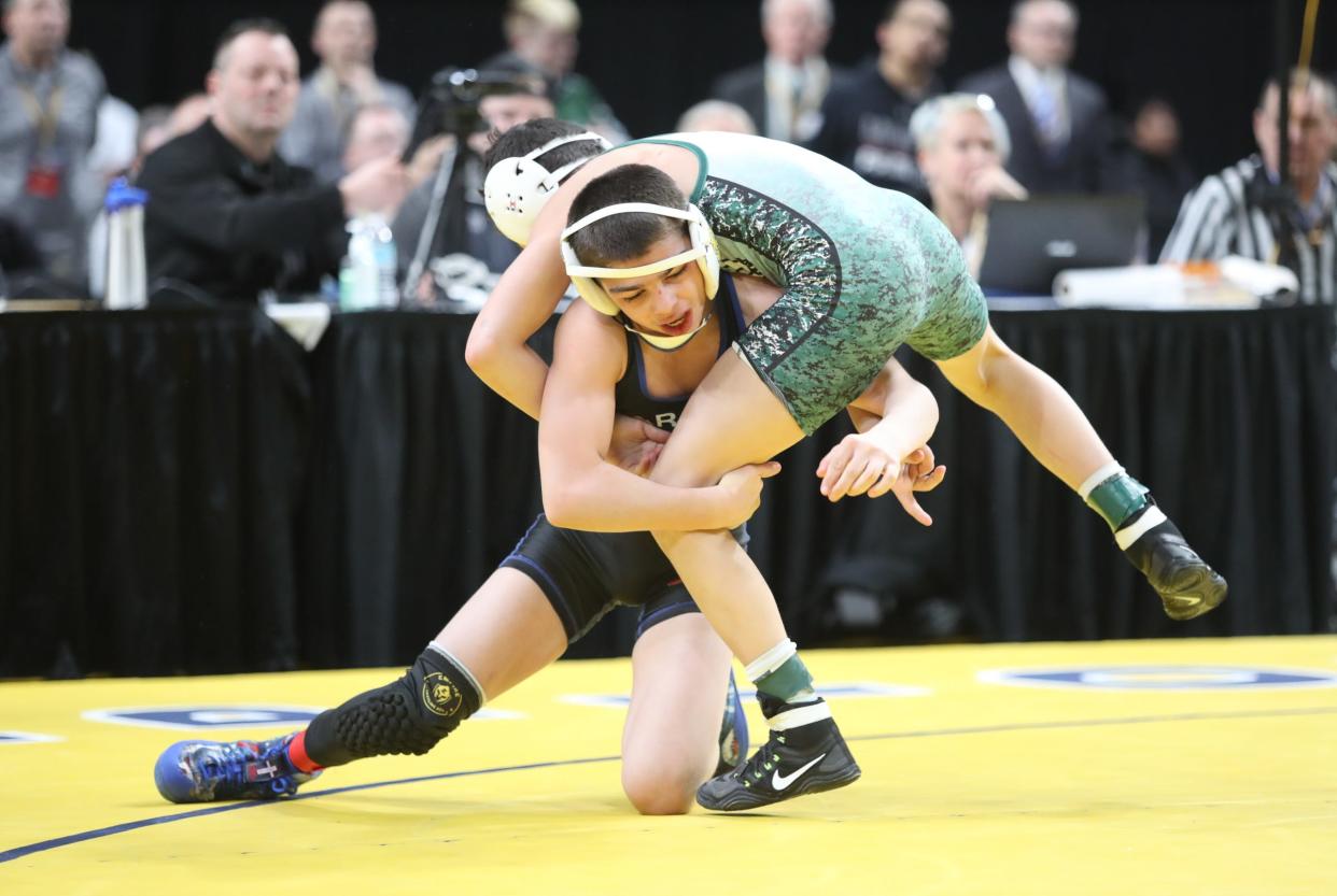 Former Carmel wrestler P.J. Duke defeats Herricks' Joseph Manfredi in the 99-pound state championship match at the NYSPHSAA Wrestling Championships at the Times-Union Center in Albany on Saturday, Feb. 29, 2020. Duke has since transferred to Minisink Valley and is now the No. 1 seed in the Division I 138-pound bracket.