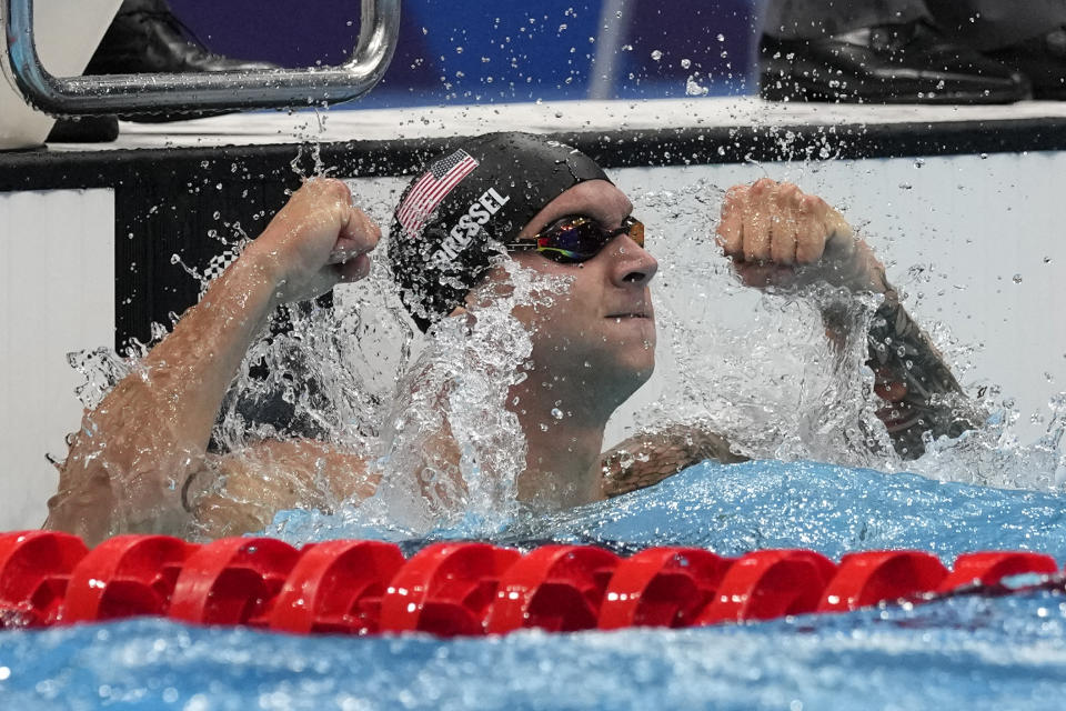 Caeleb Dressel, of the United States, celebrates winning the gold medal the men's 50-meter freestyle final at the 2020 Summer Olympics, Sunday, Aug. 1, 2021, in Tokyo, Japan.(AP Photo/Gregory Bull)