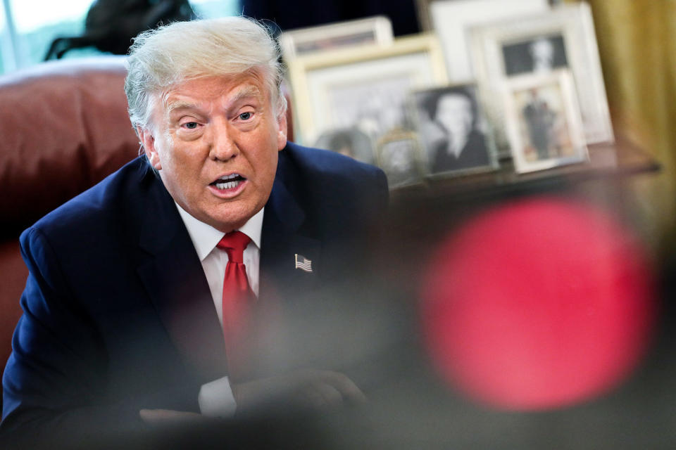 Then-President Donald Trump in the Oval Office in 2020. (Oliver Contreras / Getty Images pool file)