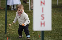 <p>A young child participates in the annual White House Easter Egg Roll on the South Lawn of the White House in Washington, U.S., April 2, 2018. (Photo: Carlos Barria/Reuters) </p>