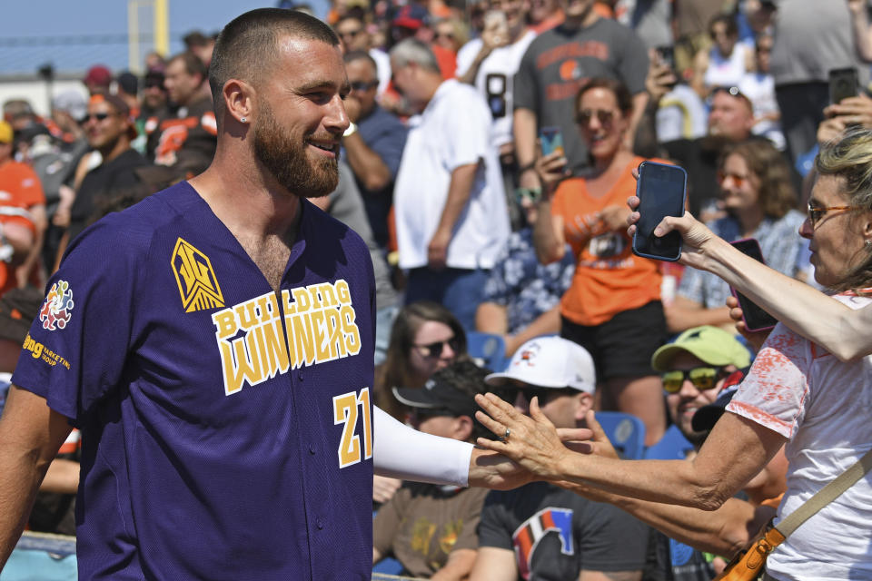 Kansas City Chiefs tight end Travis Kelce smiles for fans before the Jarvis Landry Celebrity Softball game, Saturday, June 12, 2021, in Eastlake, Ohio. (AP Photo/David Dermer)