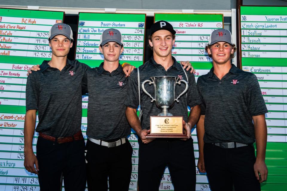 Wellesley High golfers (from left) Michael Votapka, Brian Campbell, Ben Madden and Owen Blakely pose for a picture after the Raiders won the sixth annual Cape Cod National Golf Club High School Invitational in Brewster on Sept. 25, 2022.