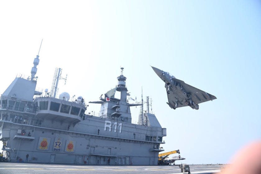 India navy aircraft carrier INS Vikrant Tejas fighter jet