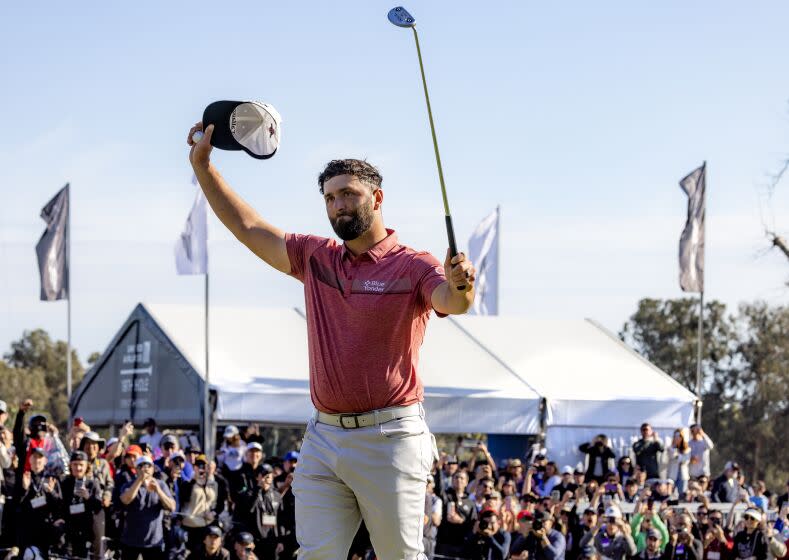 PACIFIC PALISADES, CA - FEBRUARY 19, 2023: Jon Rahm acknowledges the crowd after winning the Genesis Invitational.