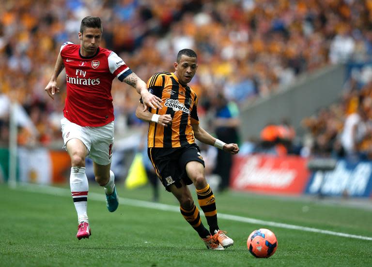 Hull City's defender Liam Rosenior (R) is challenged by Arsenal's midfielder Mikel Arteta during the English FA Cup final at Wembly Stadium in London on May 17, 2014
