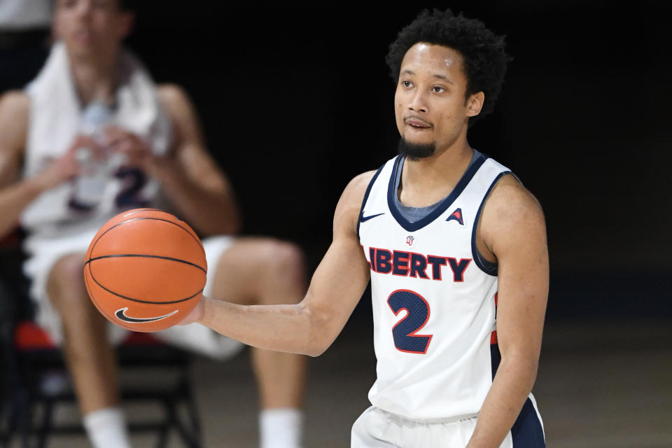 Darius McGhee and the Liberty Flames play Oklahoma State in the first round of the NCAA tournament (Photo by Mitchell Layton/Getty Images)