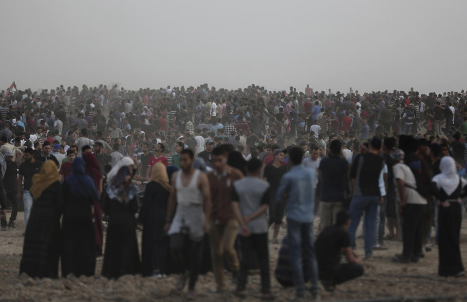 Palestinians protest at the Gaza Strip's border with Israel, Friday, Oct. 19, 2018. (AP Photo/Khalil Hamra)