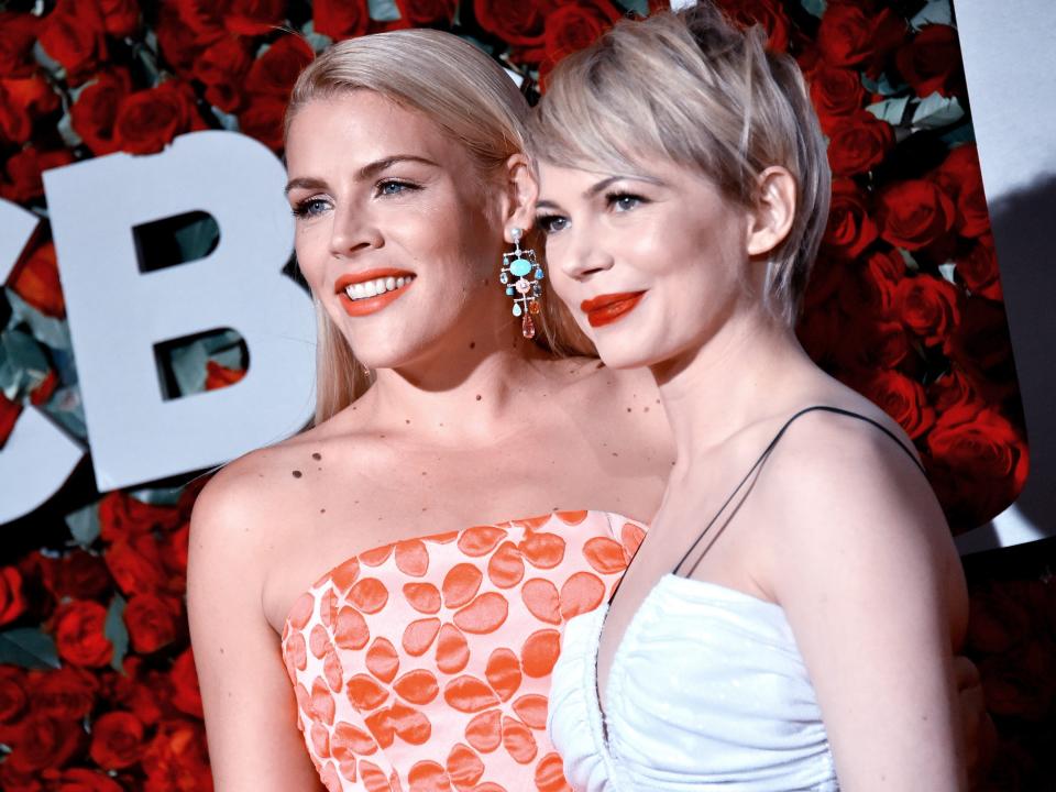 Busy Philipps (L) and Michelle Williams