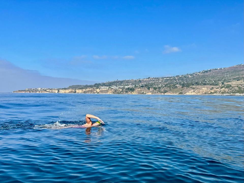 Lura Wilhelm of Redding swimming the Catalina Channel on Monday morning, Sept. 25, 2023. She finished the 20-mile swim in 11 hours and 16 minutes.