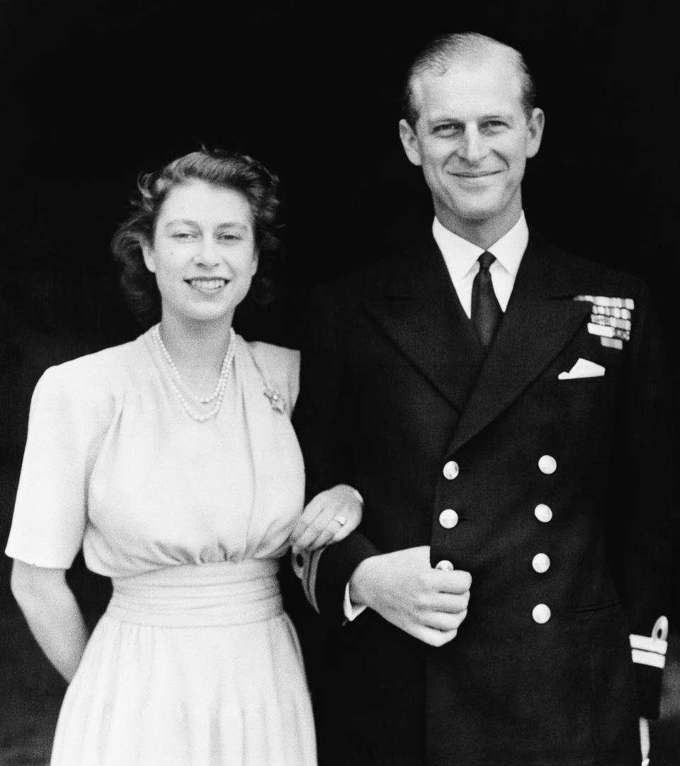 FILE - This file photo dated July 10, 1947 shows the official photograph of Britain's Princess Elizabeth and her fiance, Lieut. Philip Mountbatten in London. Buckingham Palace says Prince Philip, husband of Queen Elizabeth II, has died aged 99. (AP Photo/File)