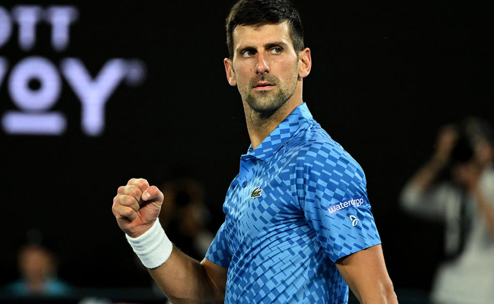 Novak Djokovic celebrates after beating Alex de Minaur at the Australian Open. (Photo by MANAN VATSYAYANA/AFP via Getty Images)