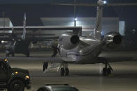 WNBA star Brittney Griner deplanes at Kelly Field in San Antonio, Texas, following her release in a prisoner swap with Russia, Friday, Dec. 9, 2022. (AP Photo/Eric Gay)