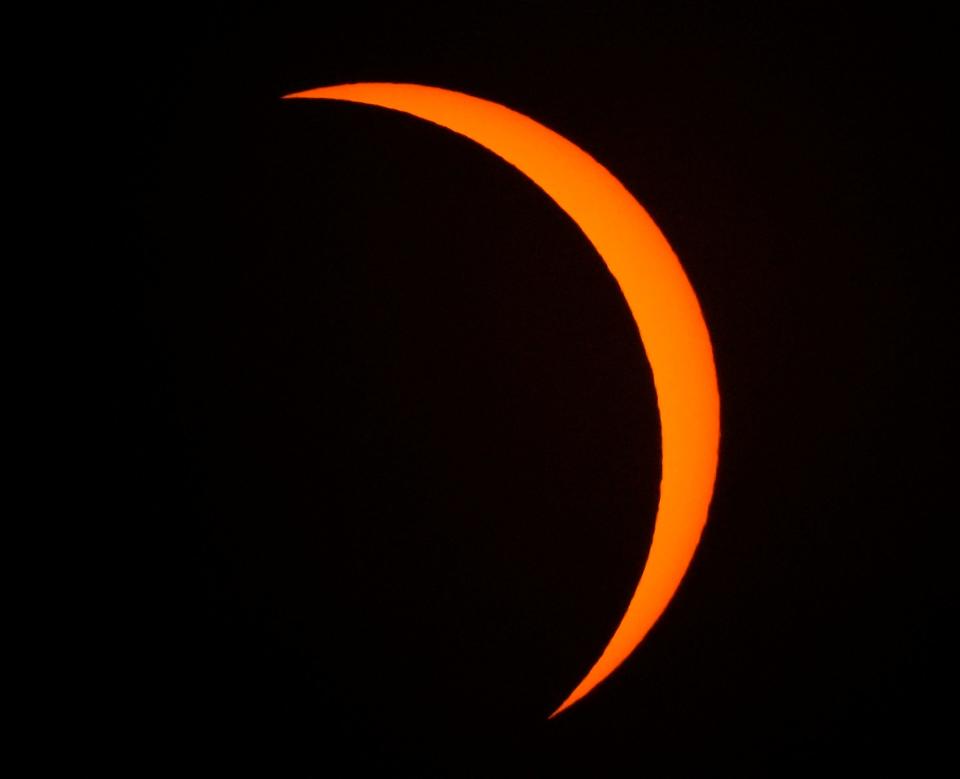 The moon covers 89% sun at the eclipse's peak coverage as seen during a solar eclipse viewing party University of Wisconsin-Milwaukee in Milwaukee on Monday, April 8, 2024. - Mike De Sisti / Milwaukee Journal Sentinel