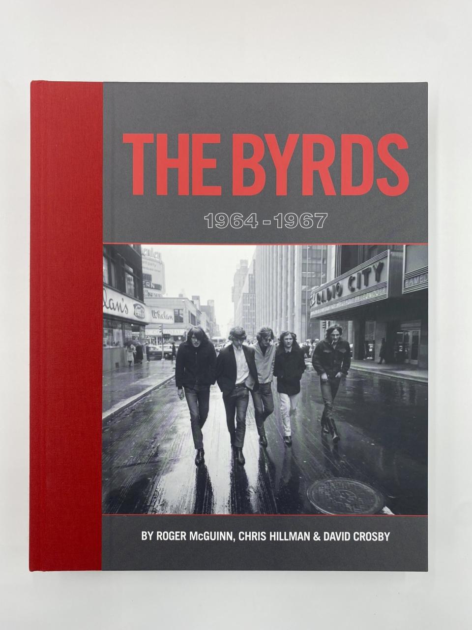 This image released by BMG shows "The Byrds: 1964-1967," a 400-page coffee-table photo book that was curated by the band’s three surviving founding members. (BMG via AP)