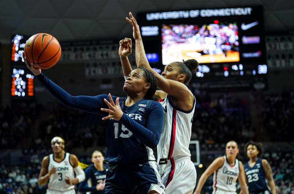 Xavier guard Mackayla Scarlett (15) shoots against UConn forward Aubrey Griffin in a February game in Connecticut. Scarlett will be in a Friars uniform next season.