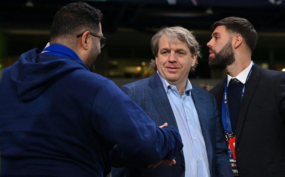 Chelsea's US owner Todd Boehly (R) reacts after the UEFA Champions League round of 16 second-leg football match between Chelsea and Borrusia Dortmund at Stamford Bridge - Getty Images/Glyn Kirk 