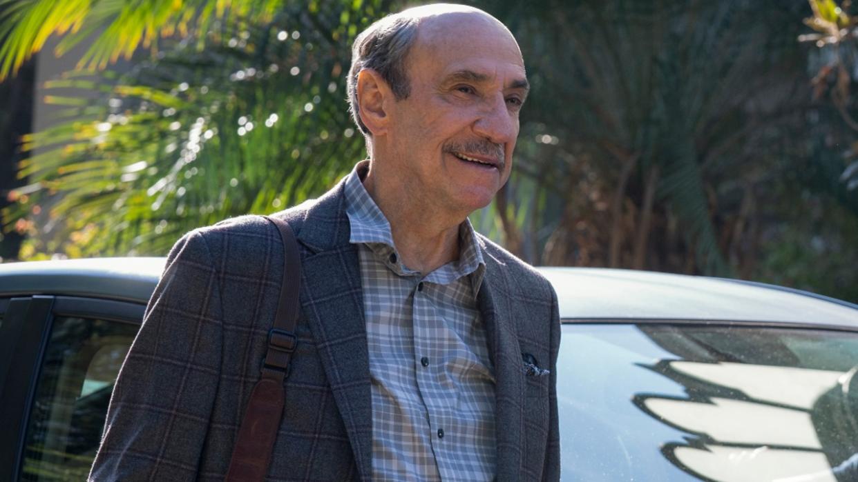  F. Murray Abraham standing by a car in Season 2 of Mythic Quest 