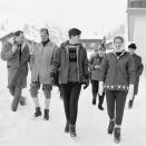 <p>Prince Philip, Prince Charles, and Princess Anne are surrounded by photographers as they take a stroll through the small ski town of Vaduz, Liechtenstein. The royal family was visiting over the New Year in 1965. </p>