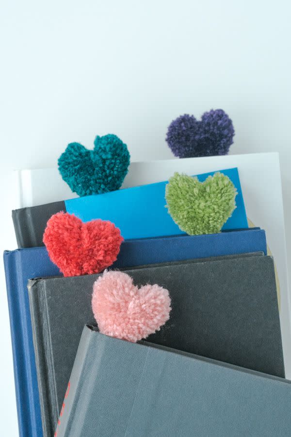 <p>Friendship bracelets are <em>so</em> elementary. This year, craft these adorable pom-pom bookmarks for all of your friends.</p><p><em><a href="https://www.designmom.com/heart-pom-pom-bookmarks/" rel="nofollow noopener" target="_blank" data-ylk="slk:Get the tutorial at Design Mom »;elm:context_link;itc:0;sec:content-canvas" class="link ">Get the tutorial at Design Mom »</a></em> </p>