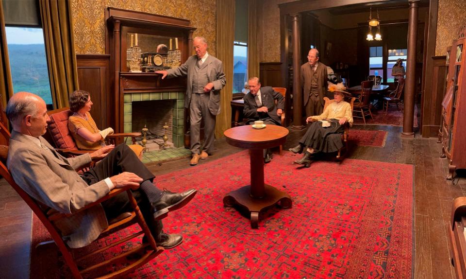 Oklahoma City resident Edward Knight, left, appears in costume behind the scenes of the movie "Killers of the Flower Moon," which filmed in and around Osage County in 2021. Knight, who is the composer in residence and director of music composition at Oklahoma City University, appears as a background actor, playing a concerned citizen at a pivotal meeting at William K. Hale's (Robert De Niro) ranch house.