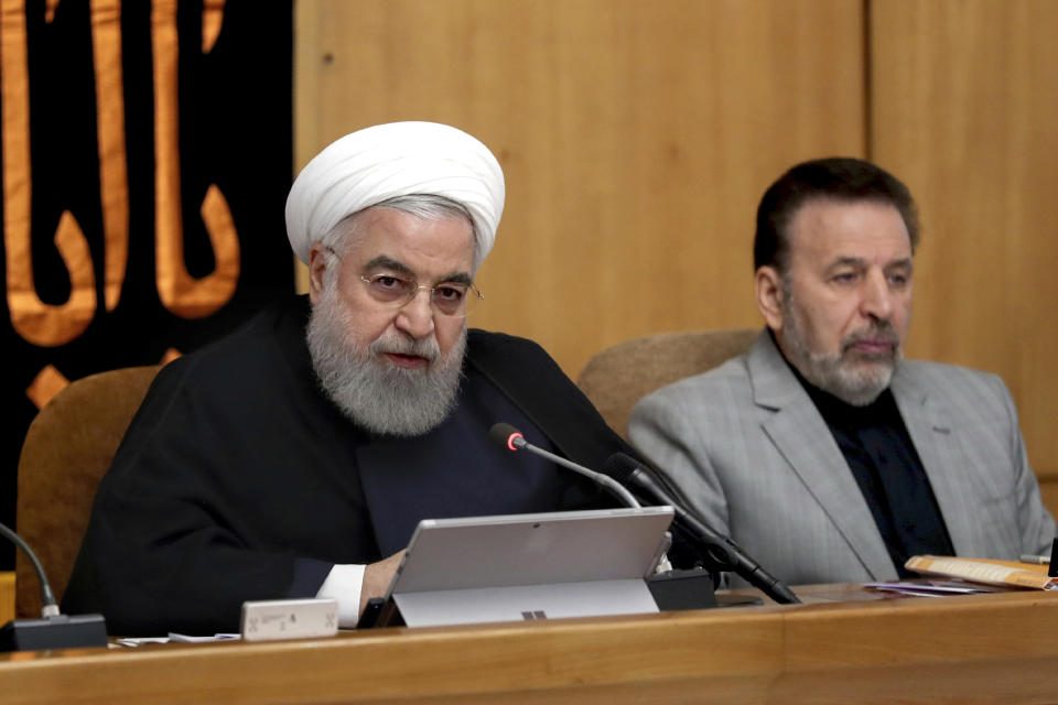 In this photo released by the office of the Iranian Presidency, President Hassan Rouhani speaks in a cabinet meeting in Tehran, Iran, Wednesday, Sept. 4, 2019. Rouhani reiterated a threat that Tehran would take additional steps away from the 2015 nuclear accord on Friday and accelerate its nuclear activities if Europe fails to provide a solution, calling it Iran's third, "most important step" away from the deal. (Iranian Presidency Office via AP)